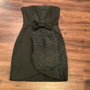 Woman’s black strapless dress